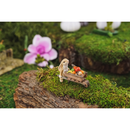 Rabbit Pushing Wheelbarrow with Harvest