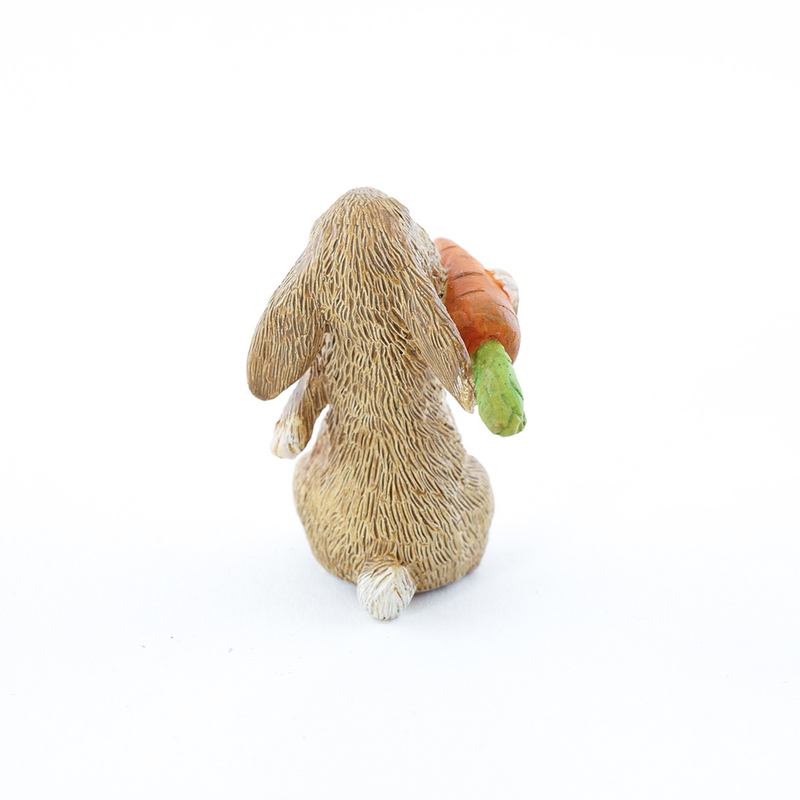 Mini Rabbit Holding Carrot