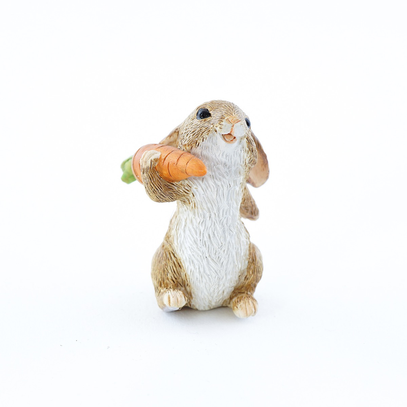 Mini Rabbit Holding Carrot